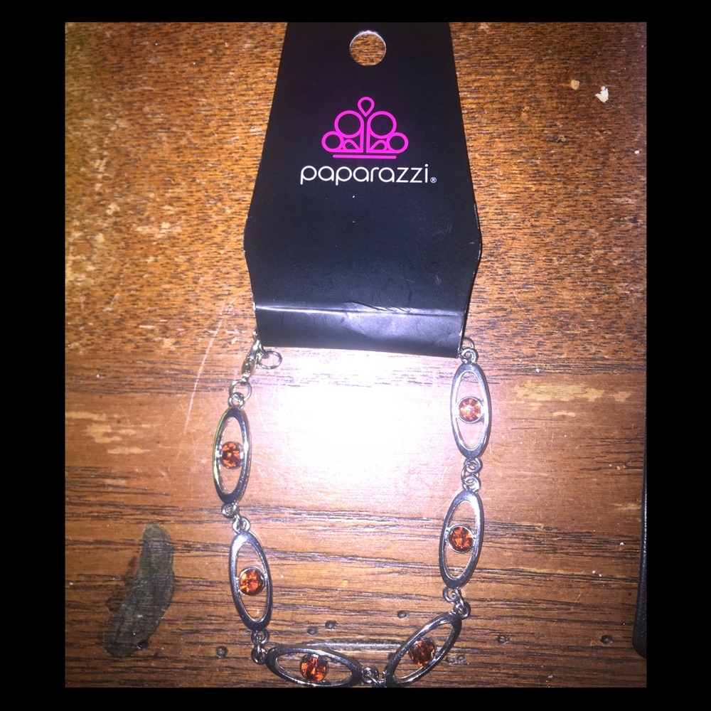 Paparazzi Silver Bracelet w/ Orange Rhine Stones